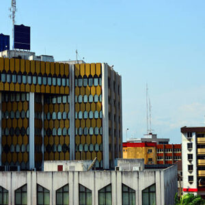 Cameroon, Douala: business district buildings - office tower - facade with golden panels - BICEC bank building - photo by M.Torres